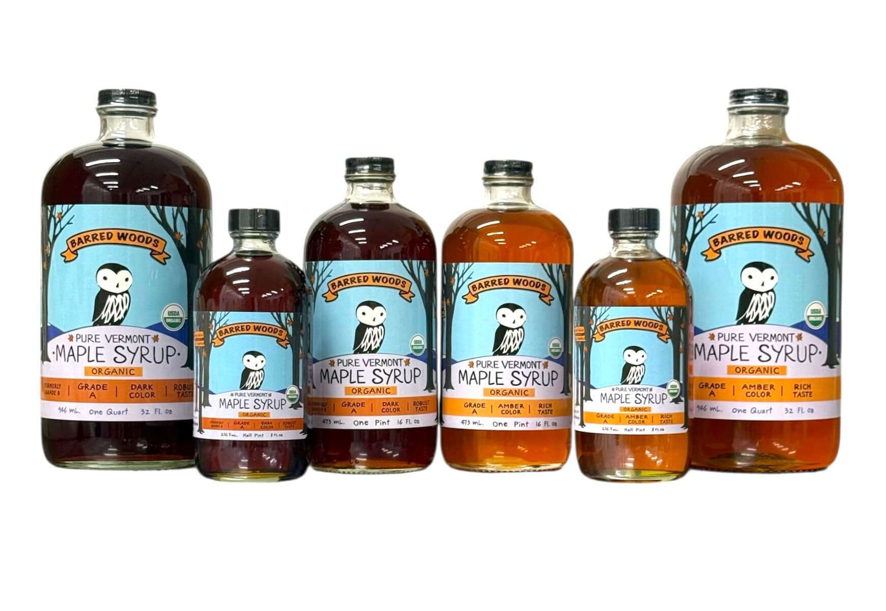Our Collection of Glass Bottles of Pure Vermont Organic Maple Syrup.