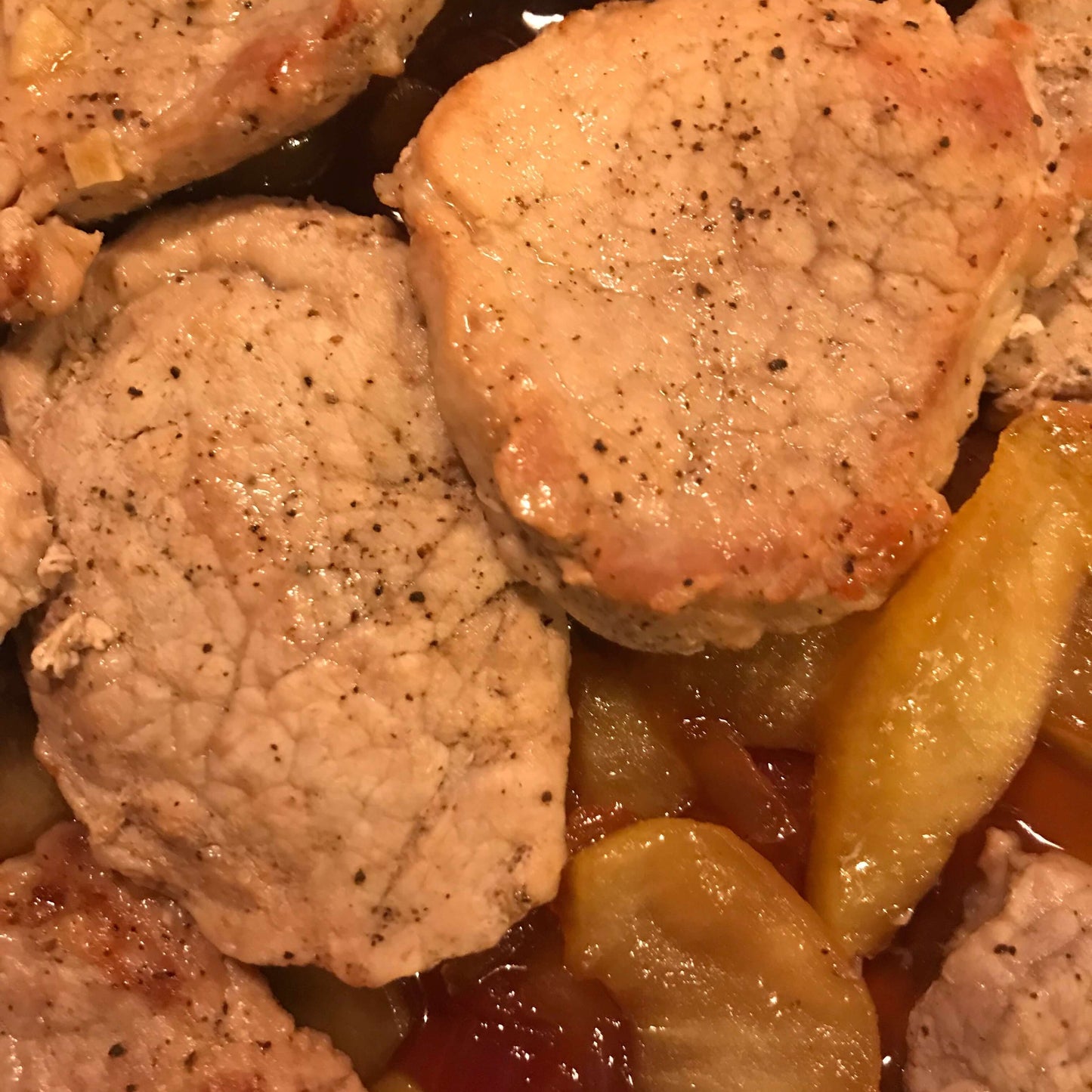 Pork chops with apples and onions cooked with pure Vermont Maple Syrup