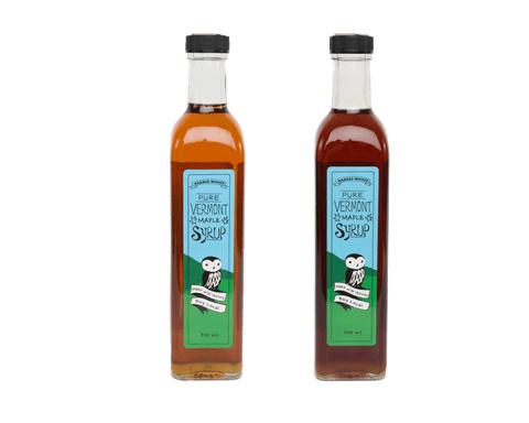 Glass Bottles of Maple Syrup. Maple Syrup in Bottles