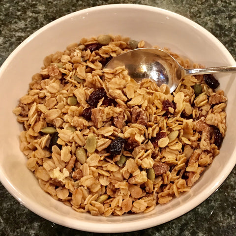 Bowl of Maple Granola with blueberries.  Made with pure organic maple sugar and organic oats. 