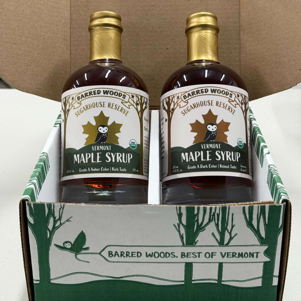 
                  
                    Two bottles of pure organic Vermont maple syrup, one of each grade.  Males a great sampler gift set of the various graders of maple syrup. 
                  
                