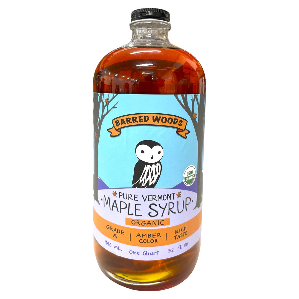 Organic maple syrup in glass bottle