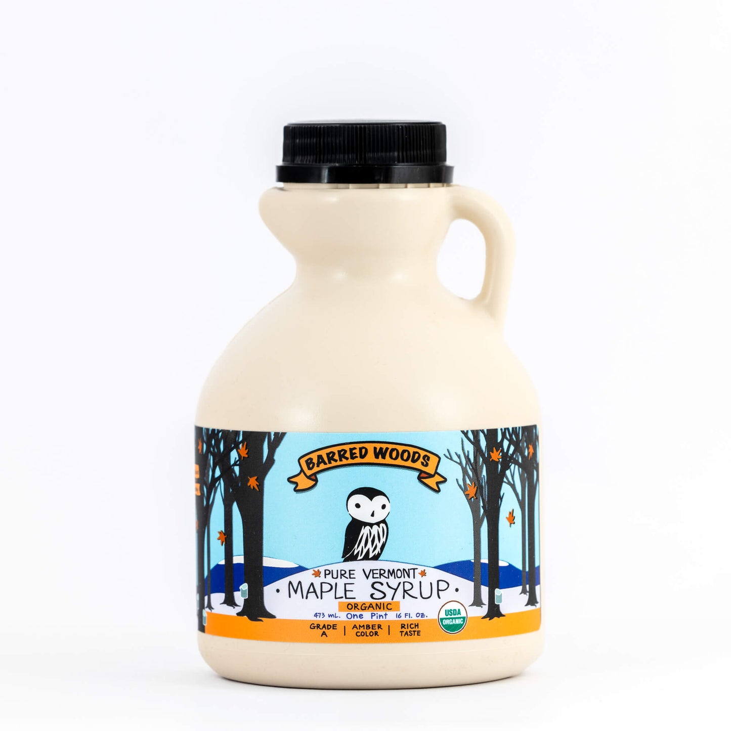 A BPA-free plastic jug of pure vermont maple syrup. It is Grade A Amber.  