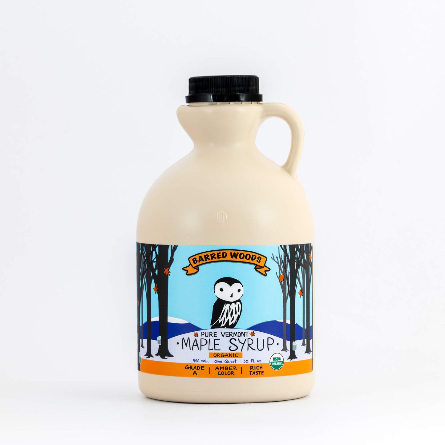 100% Pure Organic Vermont Maple Syrup in a 32 oz jug.