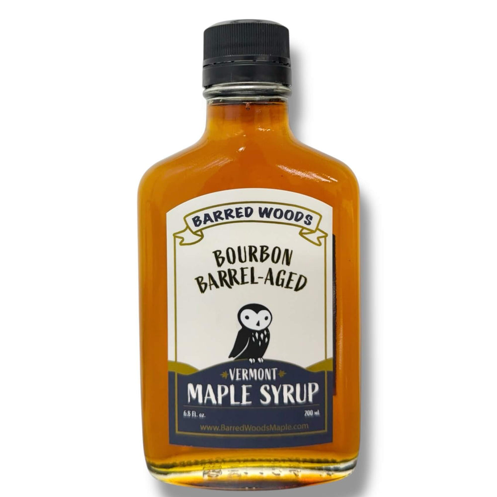 A bottle of Barred Woods Bourbon Barrel Aged Maple Syrup. 