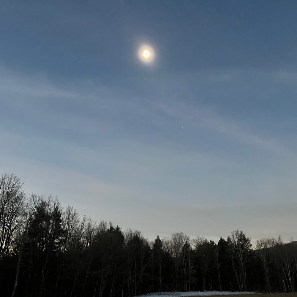 Maple sugarhouse during eclipse in 2024.   Buy maple syrup made during the eclipse. 