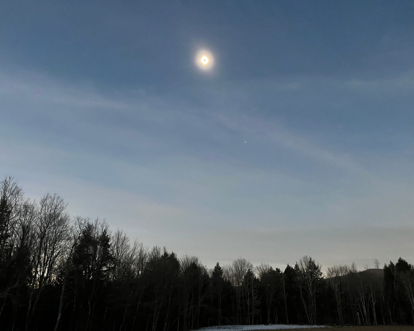 Maple sugarhouse during eclipse in 2024.   Buy maple syrup made during the eclipse. 