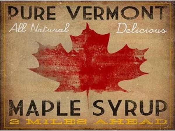 Vintage roadside sign for Pure Vermont Maple Syrup, all-natural and delicious maple syrup for sale 2 miles ahead.