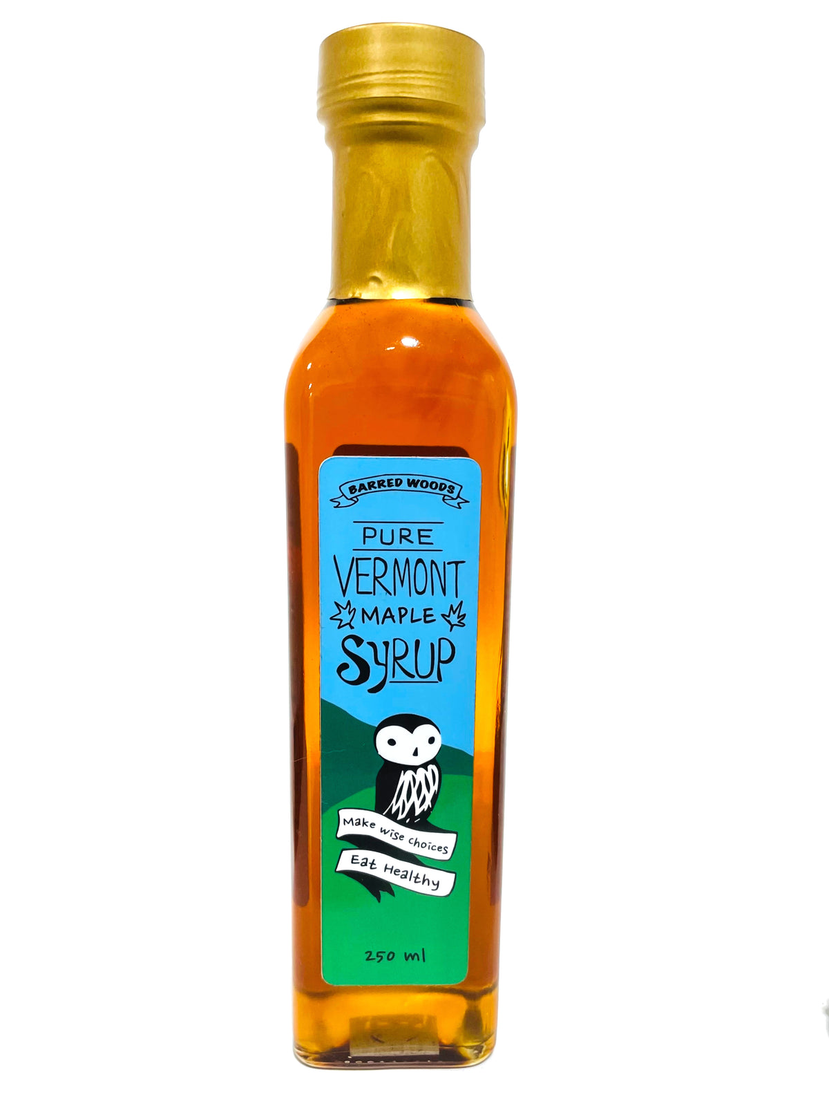 pure maple syrup in glass bottle