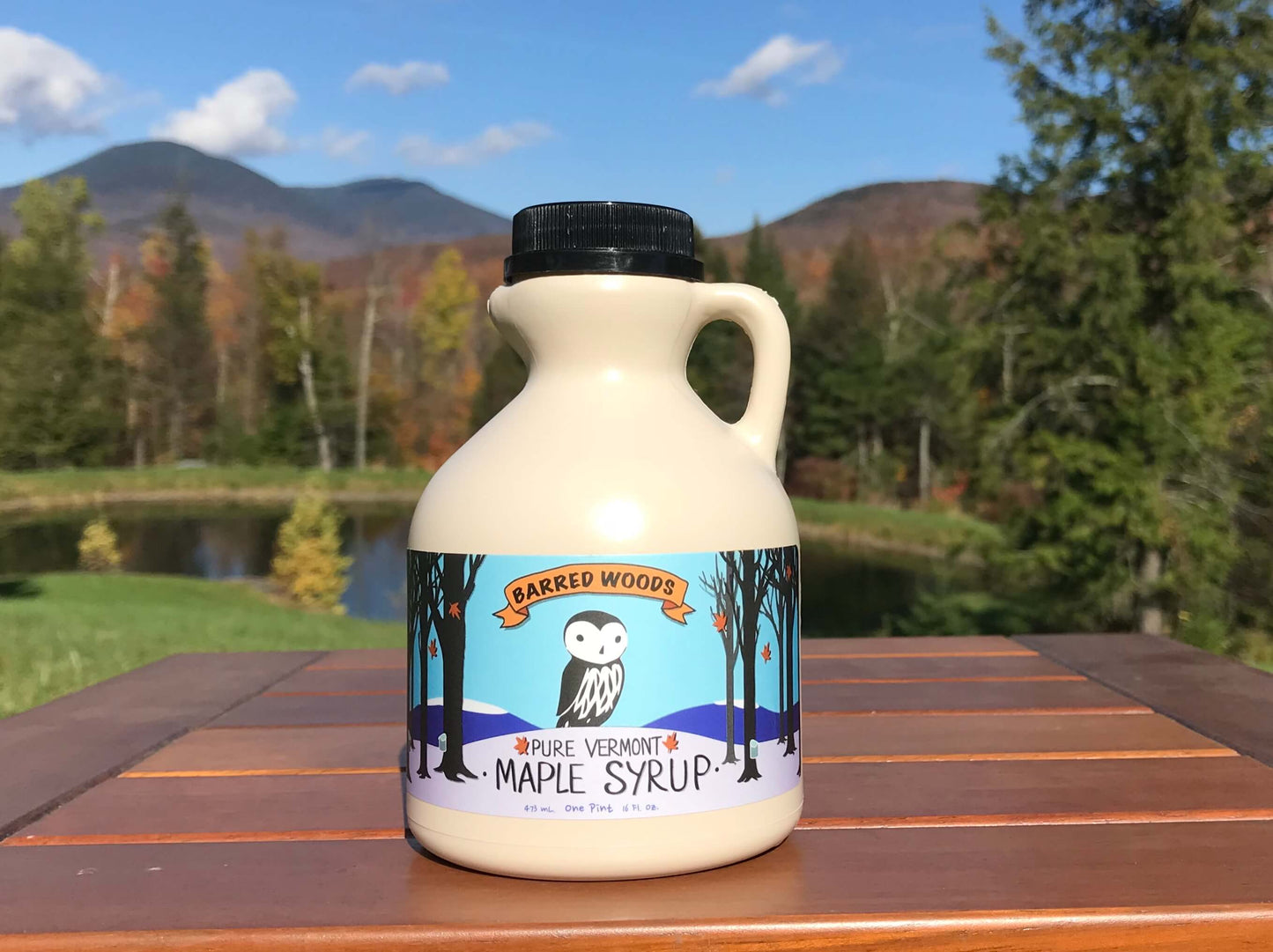 A pint jug of our Pure Organic Vermont Maple Syrup . 